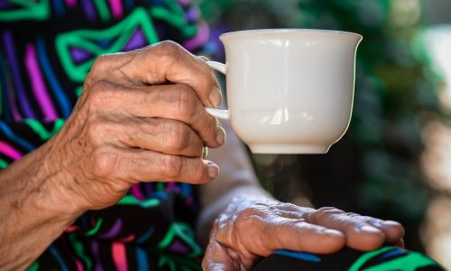 person-drinking-chatting-hand