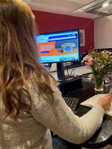 Woman looking at the ACS website on a computer